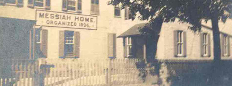 a black and white photo of the messiah home