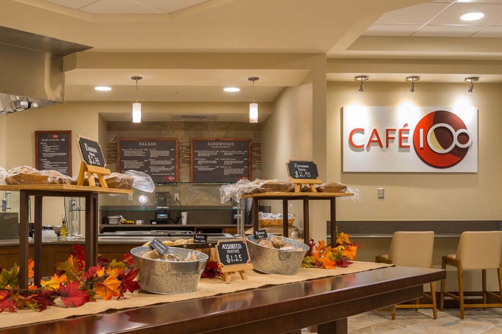 a restaurant with a sign that says cafe 100